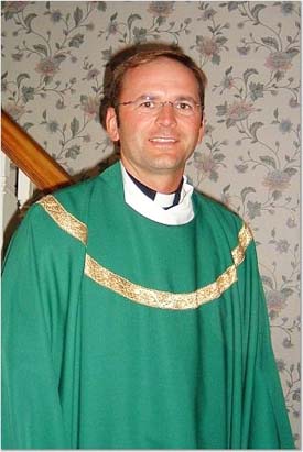Rev. Marek Tuptynski